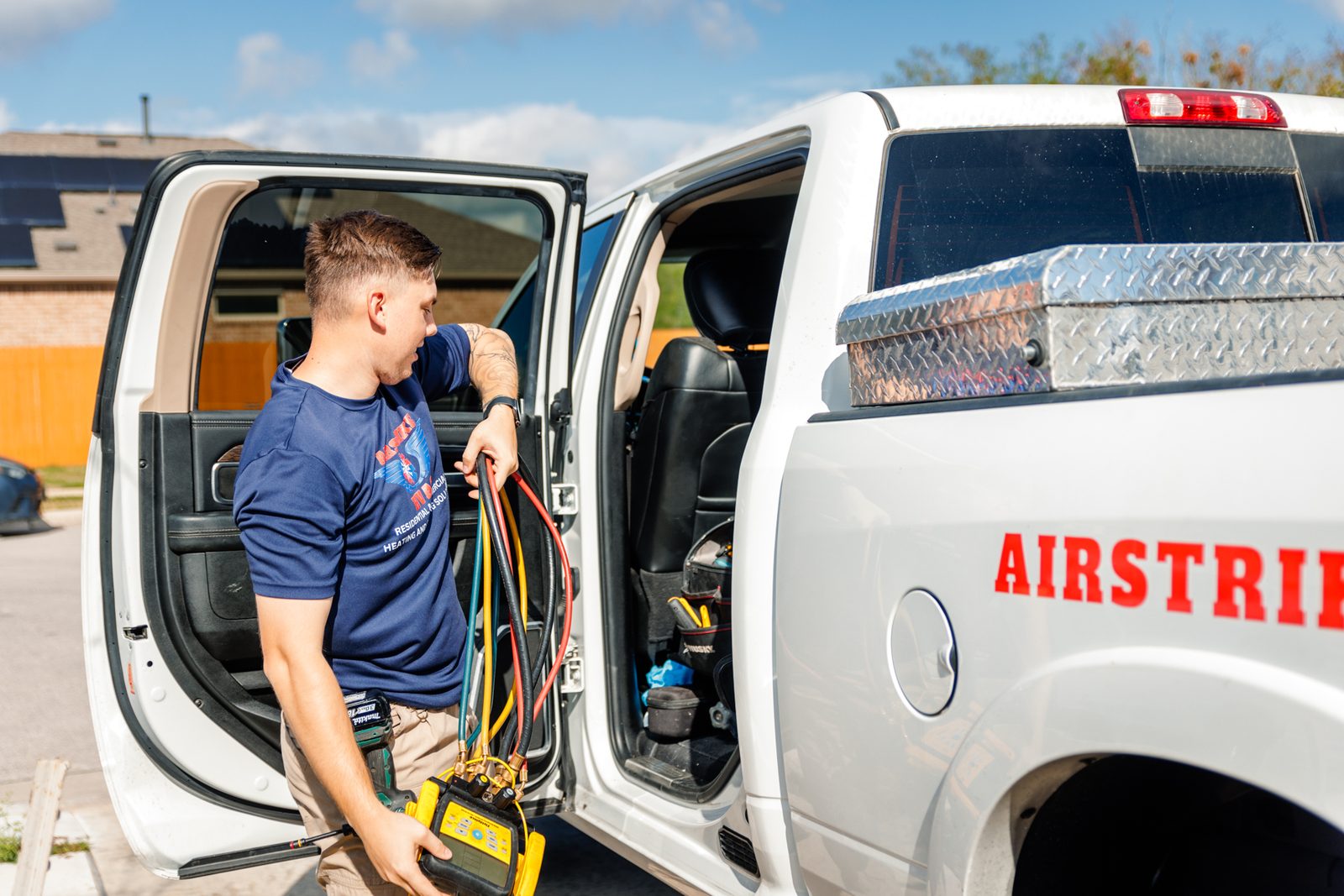 An Airstrike HVAC technician arriving at a Central Texas home